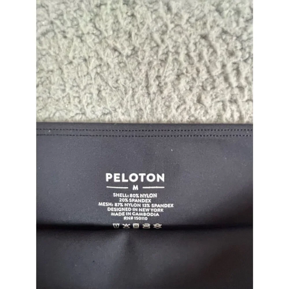 Peloton women’s Black Athletic stretch pants with Mesh and scalloped Trim M